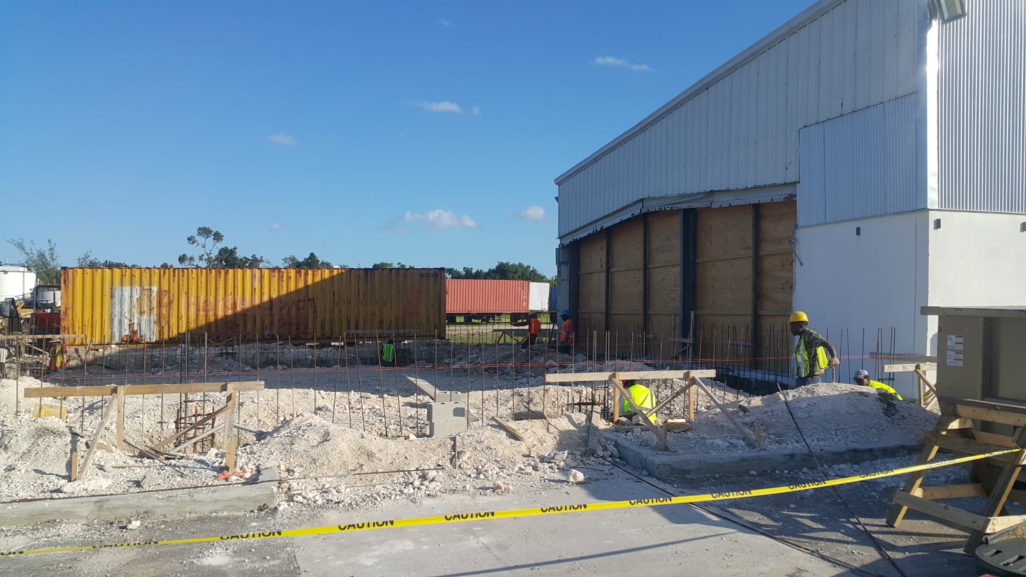 Construction site beside a commercial building